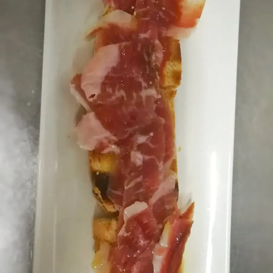 Ibérica [Gluten] Jamón Ibérico, tomate y aceite de oliva.